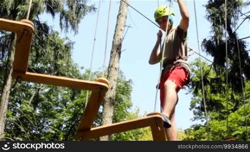 Man climbing the trees in Adventure Park