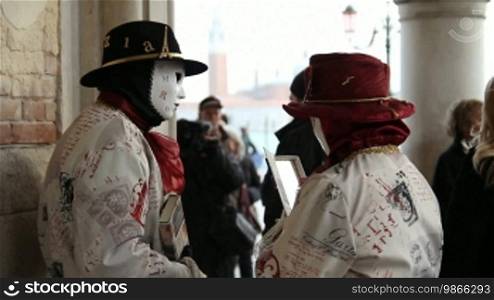 Masked people in Venice.