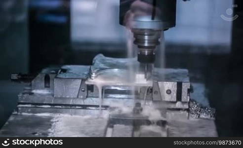 Metalworking CNC milling machine. Cutting metal modern processing technology.