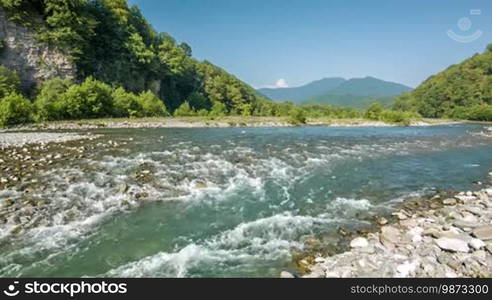 Mountain river stream on rocks in gorge