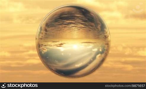 Ocean and Sunset through Glass Crystal Ball. Themes: "crystal ball gazing", fortune, future, perspectives, opportunity, sci-fi, dreams, imagination, landscapes, nature, travel, oceans, sunsets, heaven