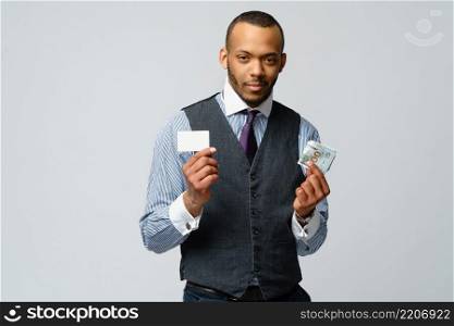 Video of Of African-american Businessman making choice between Credit Card and money. African-american Businessman making choice between Credit Card and money