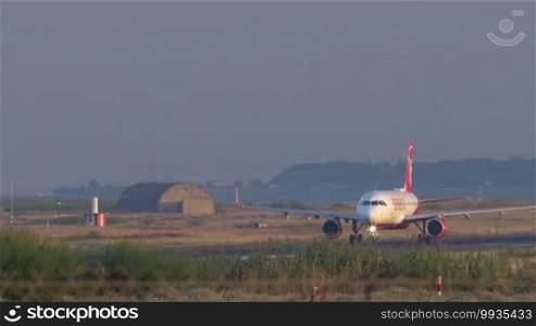 Passenger plane of airberlin airlines moving on runway after landing