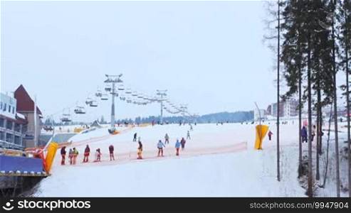 People on amateur track in winter Carpathian Mountains