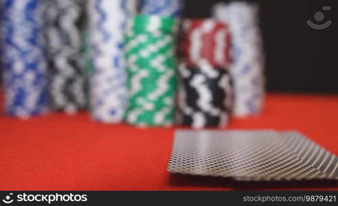 Poker player showing good card combination, pair of aces in slow motion