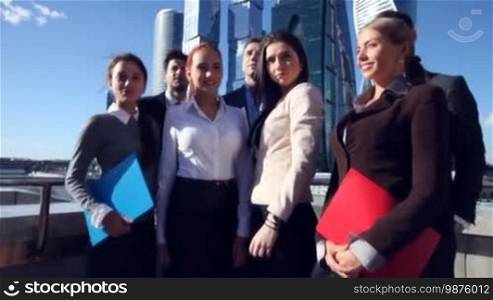 Portrait of business team at skyscrapers background