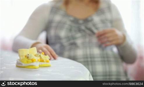 Pregnant Woman with Booties