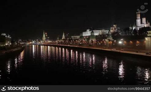 Quay near the Moscow Kremlin at night. Real-time shot. Time-lapse is also available.