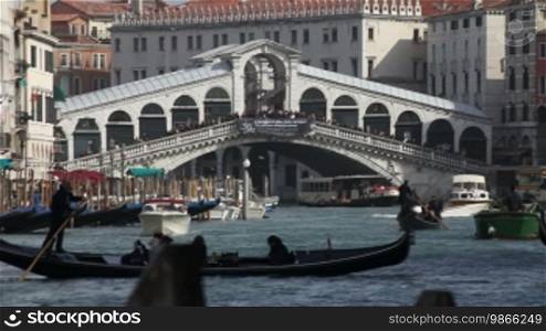 Rialtobridge and gondola, in Venice.