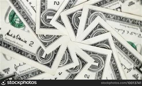 Rotating dollar bills (seamless loop)
