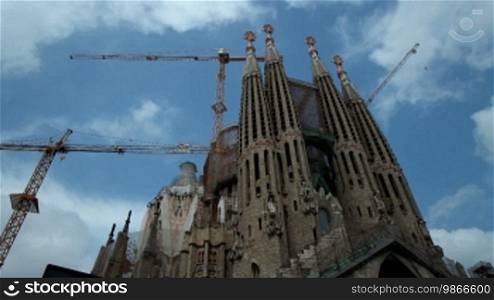 Sagrada Familia with time-lapse of clouds