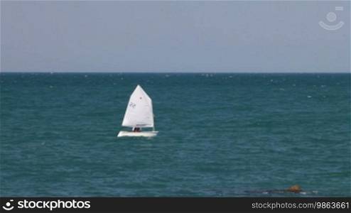Sailboat competing during regatta
