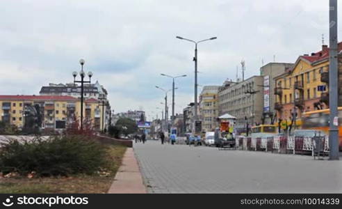 Square at main street of city on Nov 11, 2011 in Ukraine, Ivano-Frankivsk, time-lapse. Ivano-Frankivsk is known for its festivals, cultural and entertainment events
