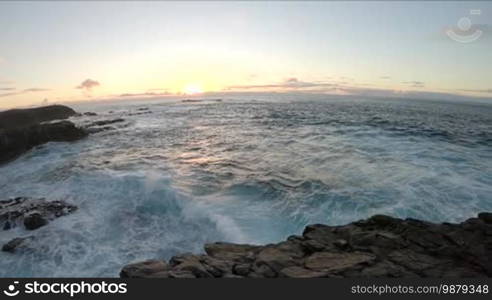 Stone cliffs, ocean waves and oceanscape. Punta Jandia, Fuerteventura, Spain