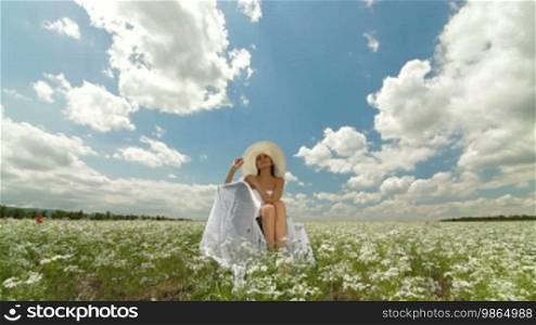 Summer Landscape With a Beautiful Woman in the White Hat