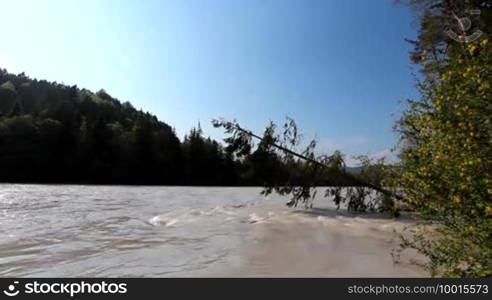 The Bavarian river Lech with a strong flow and some inundation