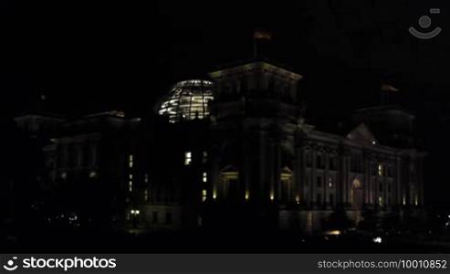 The German Parliament in Berlin, the Reichstag, at night.