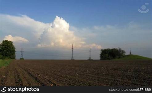 Time lapse of arable land and clouds