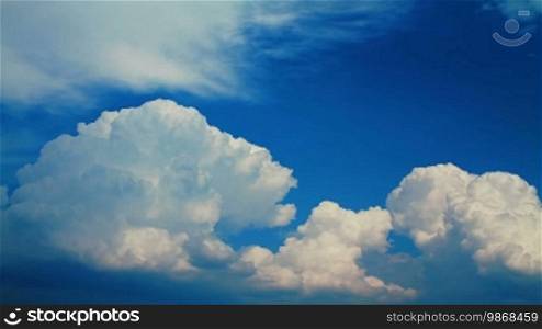 Time lapse of vibrant white blue cloudy sky
