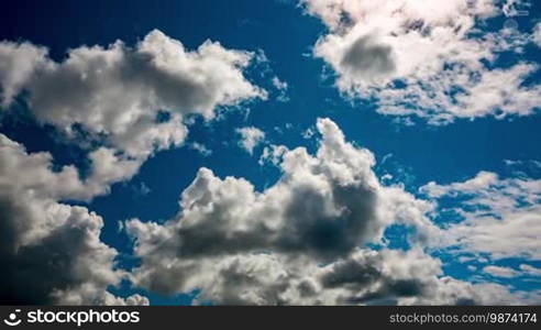 Timelapse of the blue sky moving clouds