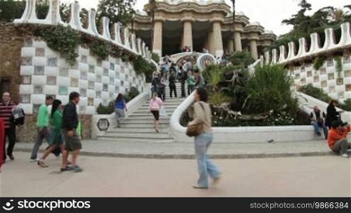 Tourists and staircase entrance, in Gnell Park, Barcelona.