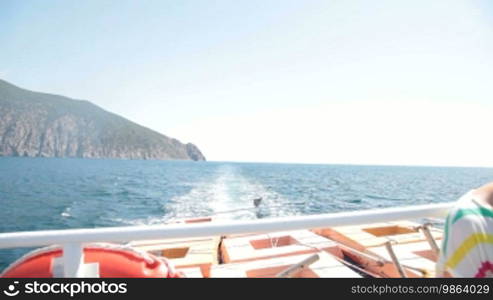 Trace of a cruise ship on the horizon of Ayu-Dag mountain, Crimea, Ukraine