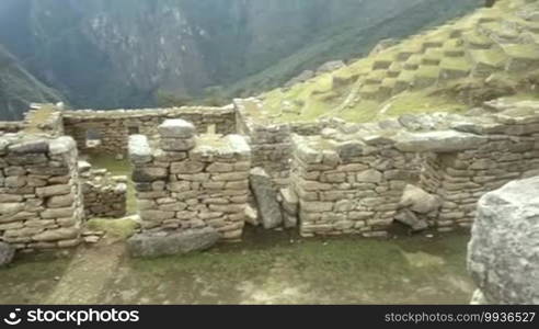 View of the ancient Inca City of Machu Picchu. The 15th century Inca site "Lost city of the Incas". Ruins of the Machu Picchu sanctuary. UNESCO World Heritage site