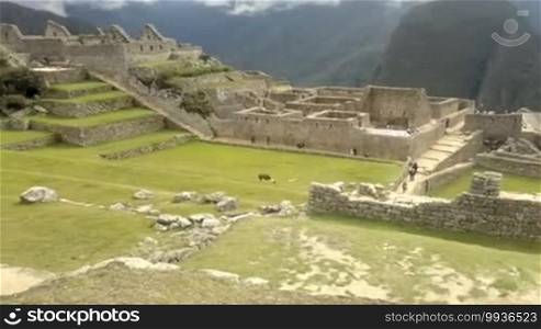 View of the ancient Inca City of Machu Picchu. The 15th century Inca site. "Lost city of the Incas". Ruins of the Machu Picchu sanctuary. UNESCO World Heritage site