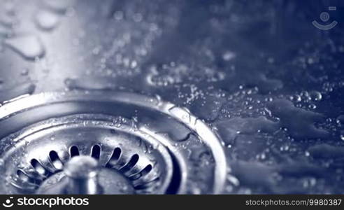 Water dripping into the kitchen sink