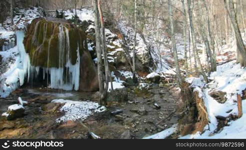 Waterfall: Silver stream in winter. Grand Canyon, Crimea, Ukraine