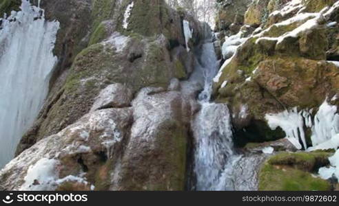 Waterfall Silver stream in winter. Grand Canyon, Crimea, Ukraine