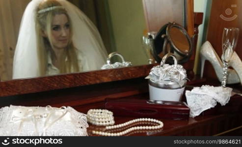 Wedding accessories, rings, shoes and pearl necklace