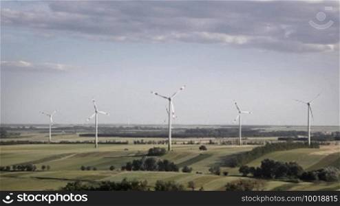 Wind energy turbines with windmills on the horizon