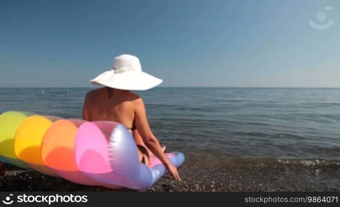 Woman enjoying the sun, sunbathing