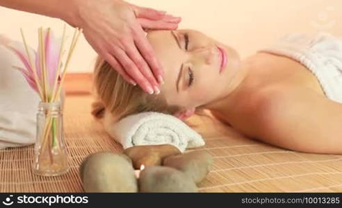 Woman getting a massage at the spa