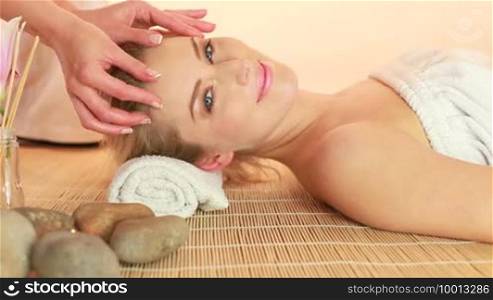 Woman getting a massage at the spa