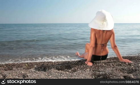 Woman in bikini sunbathing