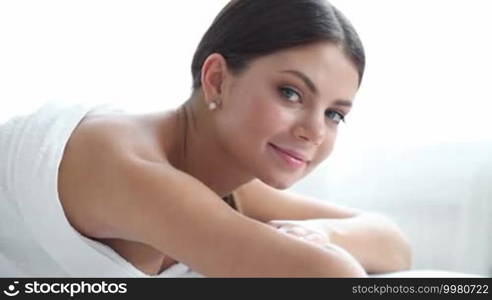 Woman smiling at spa session