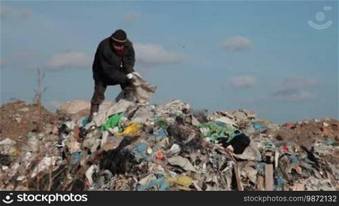 Woman working in the landfill