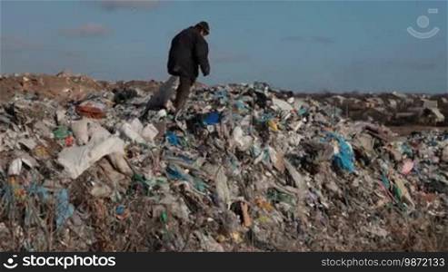 Woman working in the landfill