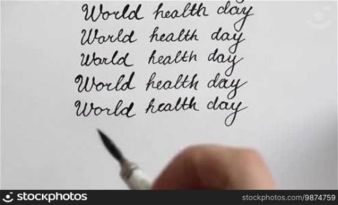 World health day calligraphy and lettering typographical design. Eighth line. Top view.