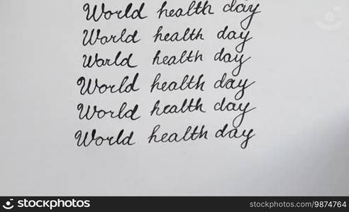 World health day calligraphy and lettering typographical design. Ninth line. Top view.