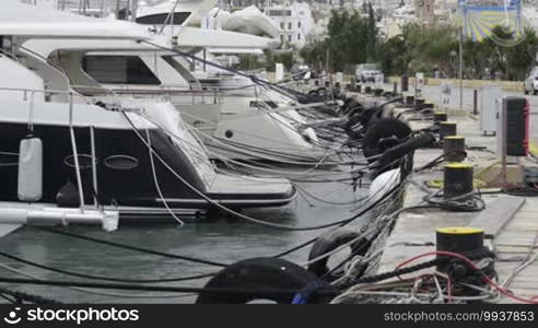 Yachts moored at Manoel Island Marina in Malta. Sail boats in a row on docks at seaside harbor.