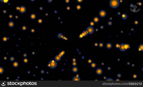 Yellow full spheres in blue light symmetrically fly against a dark background
