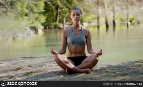 Yoga, meditation and health, pretty young woman and lotus position. Part 1 of 7