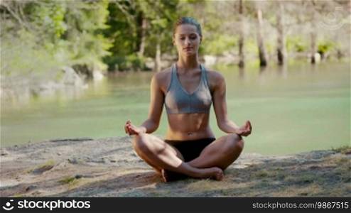 Yoga, meditation, people and health, pretty young woman smiling during lotus position. Part 2 of 7