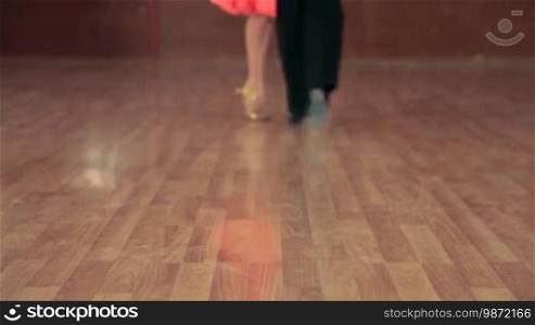 Young dancers' feet waltzing, DOF
