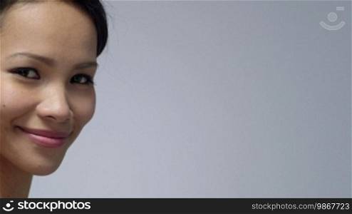 Young people, female teen, woman, beauty and body care, portrait of happy Asian girl smiling in studio on gray background. 8 of 16