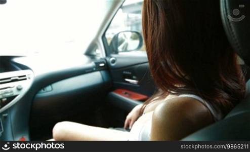 Young Woman Inside Car