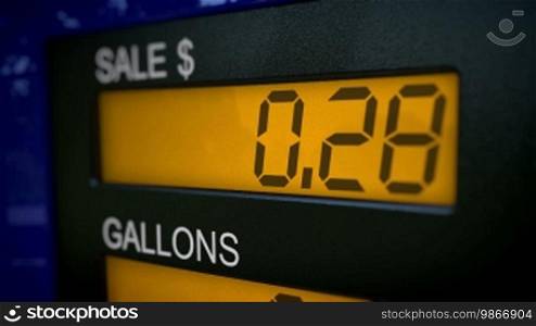 Zoom in on gas pump display in real time with rising numbers starting at zero